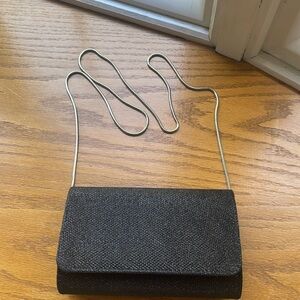 black sparkly versona bag